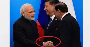 India PM, Pakistan President shake hands at SCO Summit