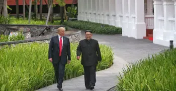 In Pictures: Trump and Kim meet for historic summit