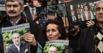 Turkish court convicts 13 journalists on terrorism charges
