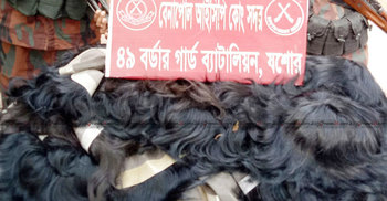 ১৩ লাখ টাকার নকল চুলের টুপি জব্দ