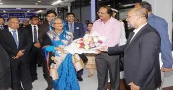 PM returns home from Australia