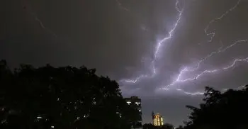 At least 125 killed as storms batter India