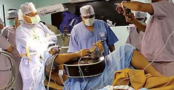 Musician plays guitar during brain surgery