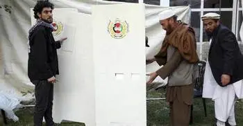 Afghans vote amid chaos, corruption and Taliban threats