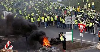 1 dead, over 100 injured in French protests over fuel prices
