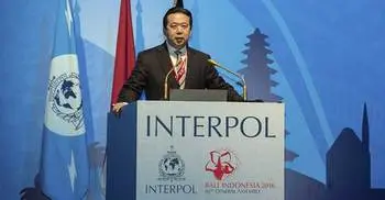 China confirms detention of Interpol chief