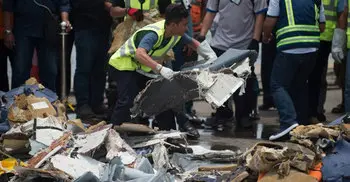 Search teams recover seats, wheels from Indonesia jet crash site