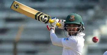 Mominul departs following his eighth Test ton