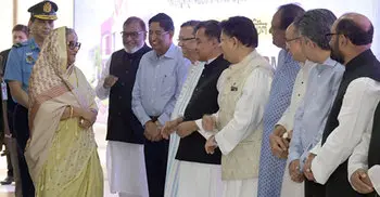 PM returns home from London