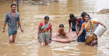 India floods: At least 100 killed, hundreds of thousands evacuated