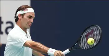 Federer sweeps past Isner in Miami final for 101st title