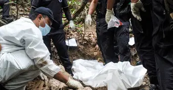 Malaysia begins inquiry into 2015 discovery of mass graves