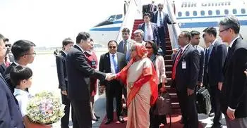 Beijing rolls out red carpet for PM