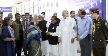 PM returns home from China