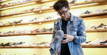 Shoe giants urge Trump to end trade war