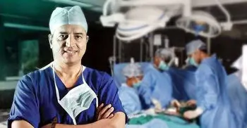 Indian cardiologist Shetty examining Quader