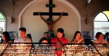 Twin bombings at church kill 21 in Philippines