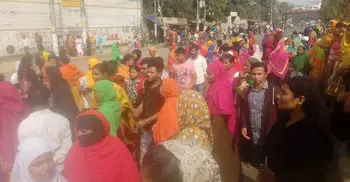 Garment workers take to street again