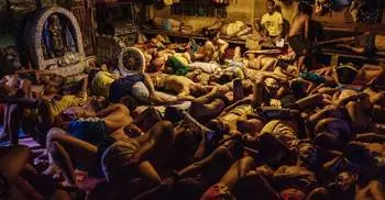 Where 518 inmates sleep in space for 170 in Manila jail