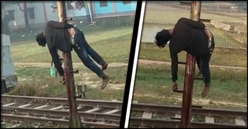 চলন্ত ট্রেনের দরজায় উঁকি দিয়ে খুঁটিতে ঝুলে গেলেন যুবক