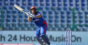 Afghan bowlers deliver another massive win to stay second