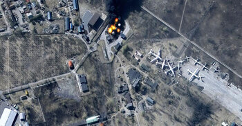 Russian warplanes, artillery widen attack, hit industry hub