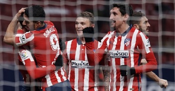 Atletico Madrid win to return to La Liga summit