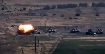 Armenian, Azeri forces battle again, 21 killed