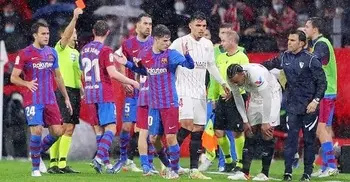 Barca draw at 10-man Sevilla