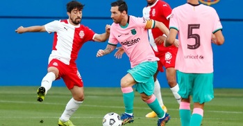 Messi motors Barcelona past Valladolid