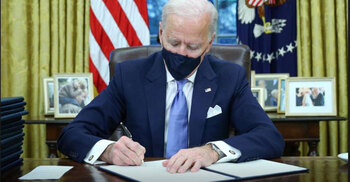 Biden rolls back Trump policies on wall, climate, health, Muslims