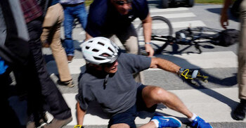 Biden falls after flubbing bike dismount, but uninjured