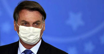 Brazil's president again tests positive for Covid-19