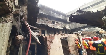 Fire destroys four-storey city building