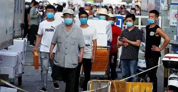 China reports 49 new COVID-19 cases, Beijing begins mass testing