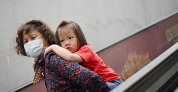 China formally passes three child policy