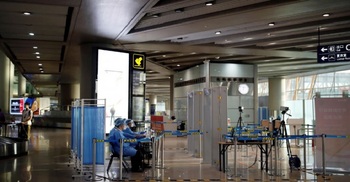 China blocks travellers from virus-hit Britain, Belgium, Philippines