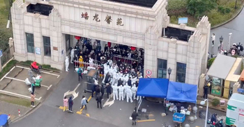 China softens tone on COVID severity after protests