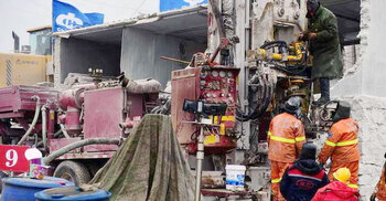 China rescues 11 miners after 14 days trapped underground