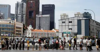 Singapore reports 942 new COVID-19 cases in record daily jump