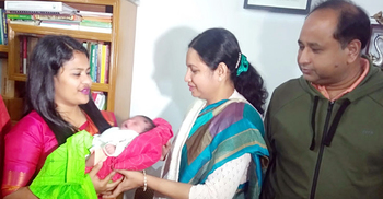 শিশুটিকে বুকে জড়িয়ে ডিসি বললেন আমার সন্তান