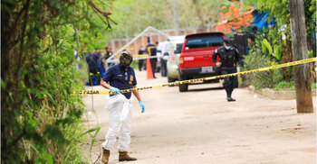 10 bodies found on former El Salvador police officer’s property