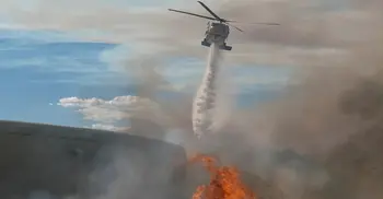 Massive California fire eases with rains