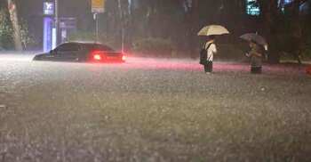 Record rainfall kills 8 in Seoul