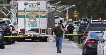 Florida gunman kills 4, including mom still holding baby
