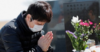 Ten years on, Japan mourns victims of earthquake and Fukushima disaster