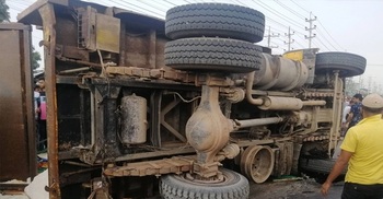 Two die as truck falls on auto-rickshaw