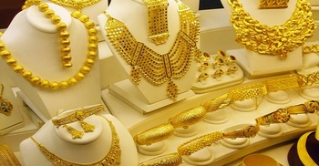Gold prices hit $2,000 an ounce for first time