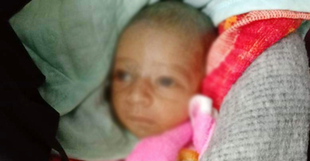 ধানক্ষেত থেকে জীবিত নবজাতক উদ্ধার