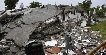 Haiti quake survivors cry for help as death toll nears 2,000